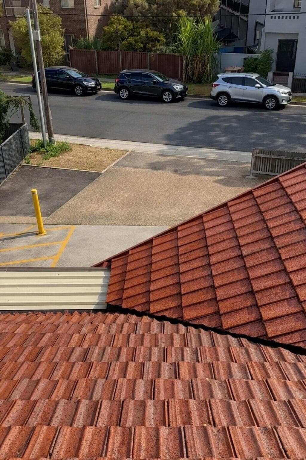 After — freshly pressure cleaned terracotta tile roof in NSW with restored colour by VD Painting